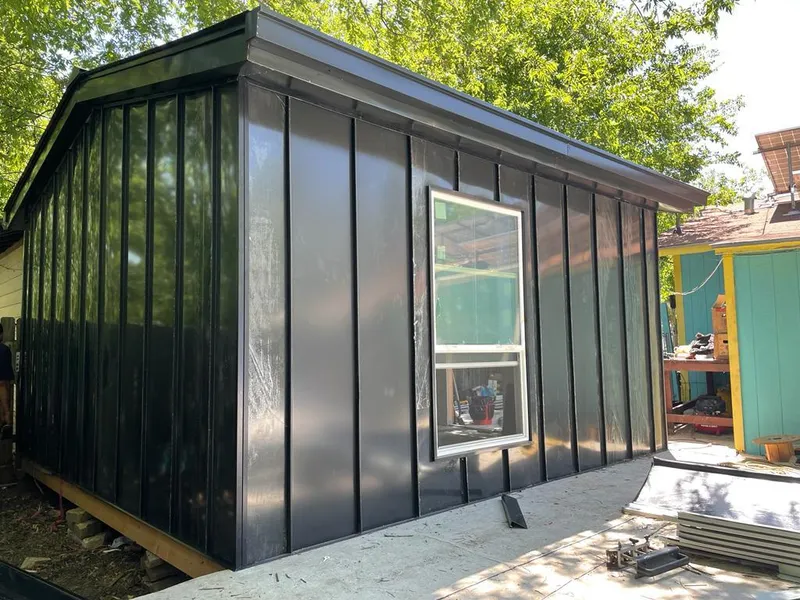 Black standing seam metal wall panels for Roof Inspection in Oildale