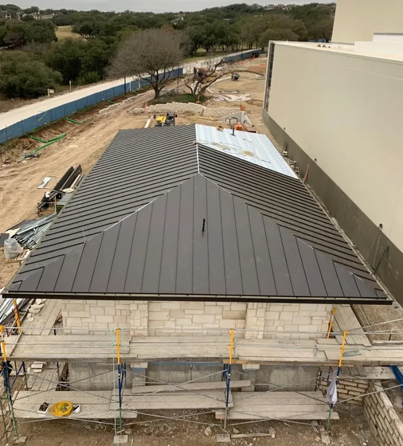 Metal roof new construction with scaffolding in Oildale